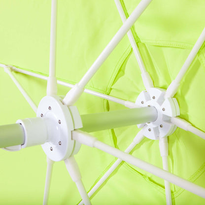 underside of lime green beach umbrella canopy