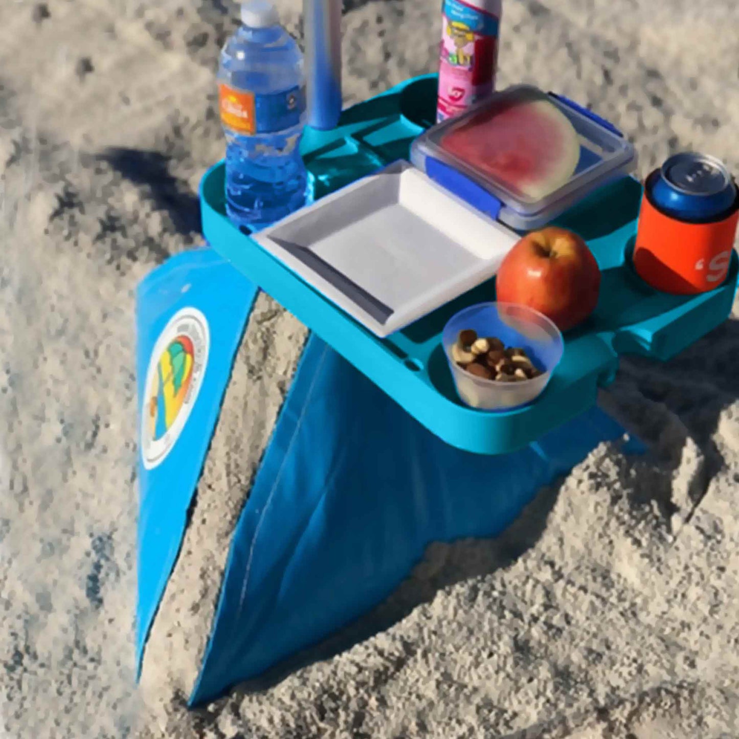 beach umbrella tray table with drinks and snacks